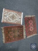 Three Iranian hearth rugs