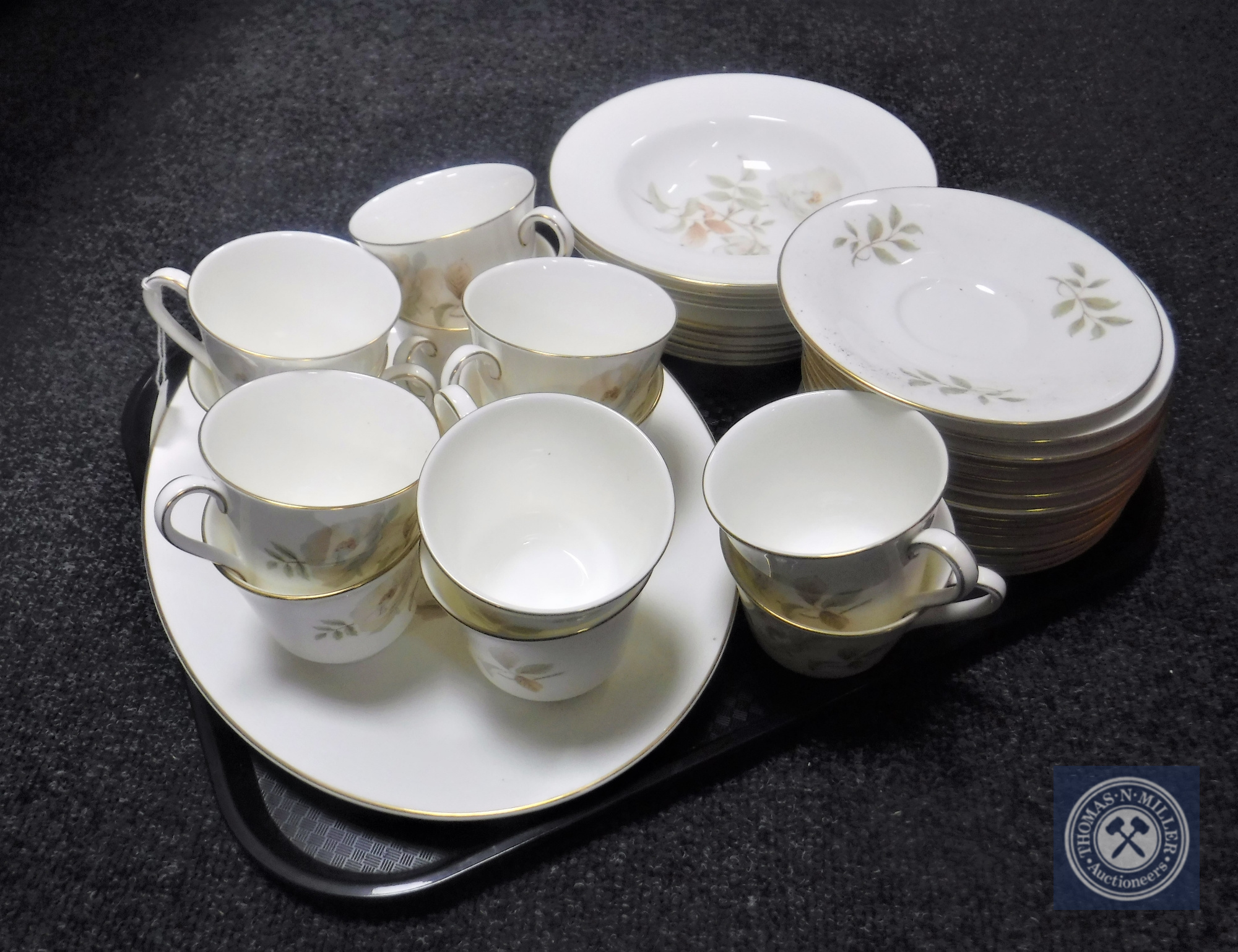 Fifty-five pieces of Royal Doulton Yorkshire Rose tea and dinner ware