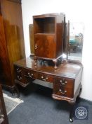 A mahogany Queen Anne style dressing table and bedside cabinet