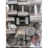 A tray of vintage metal weights