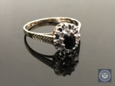 A 9ct gold sapphire and diamond cluster ring, size Q CONDITION REPORT: 1.