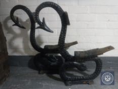 A pair of Victorian cast iron bench ends modelled as serpents