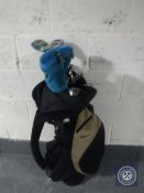 A Knight golf bag containing Lynx irons and Mizuno drivers
