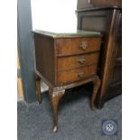 A walnut Queen Anne style bedside chest