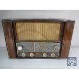 A mid 20th century walnut cased Mohawk 562 valve radio (continental wiring)