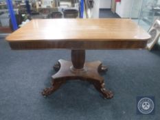 A William IV mahogany pedestal side table on paw feet