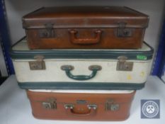 Three vintage luggage cases