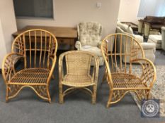Three bamboo and wicker armchairs