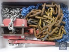 A crate of lever hoist and chains