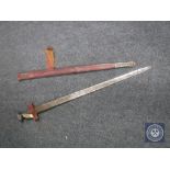 A late 19th/early 20th century Sudanese Kaskara sword in scabbard