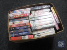 A box of VHS tapes