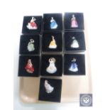 A tray of ten boxed miniature Royal Doulton figurines (one damaged)