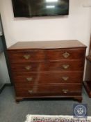 A George III mahogany chest of five drawers,