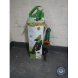 A boxed Garden Line garden vacuum and a Challenge electric strimmer