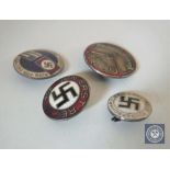 Four enamelled German badges