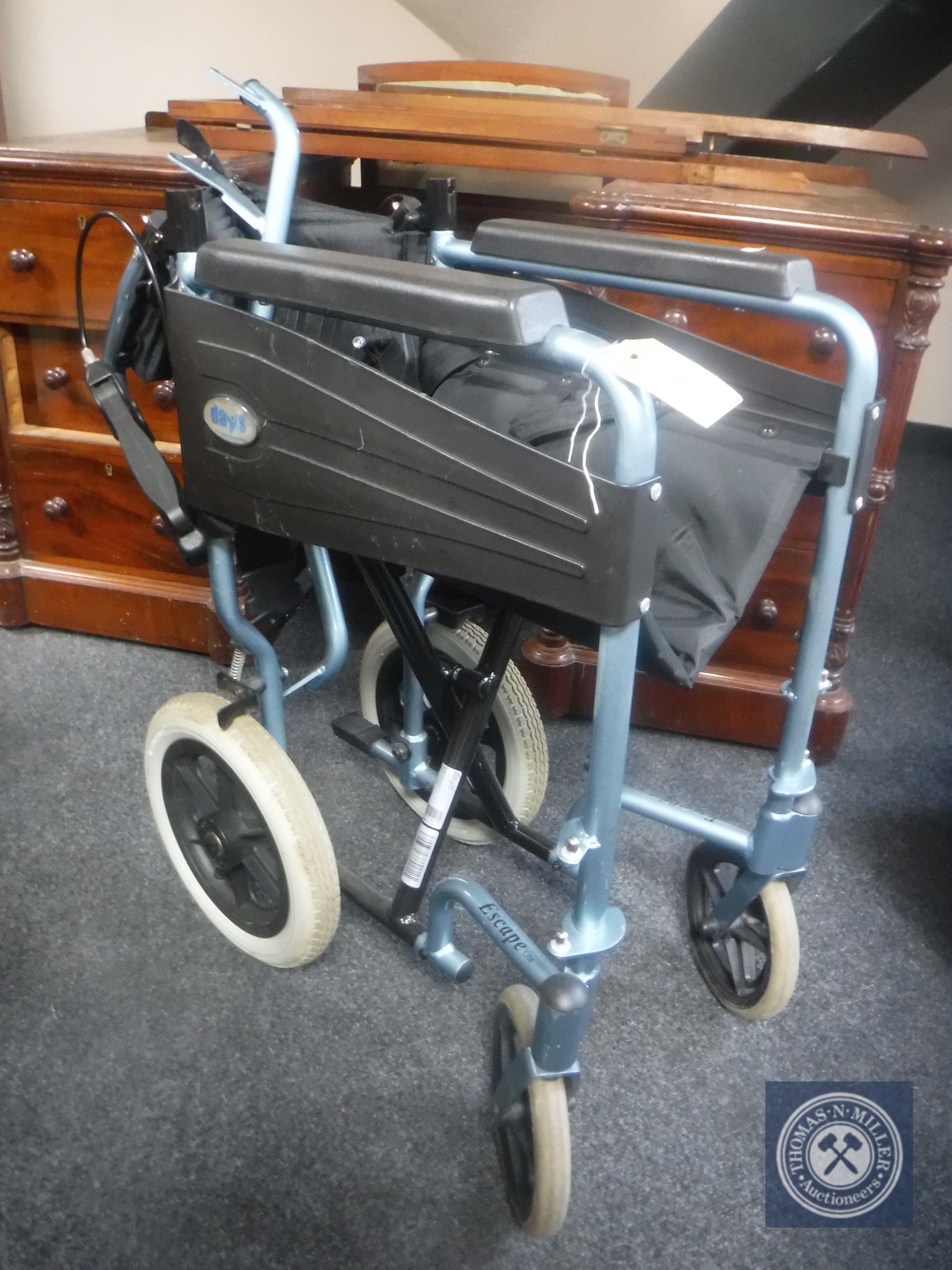 A folding wheel chair