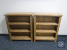 Two sets of contemporary oak open book shelves