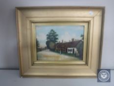 An antique gilt framed oil on board of Old Wilford