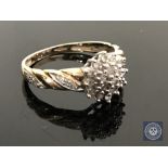 A 9ct gold diamond set cluster ring, size L CONDITION REPORT: 2.