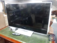 A Panasonic TX-L50 A6B 50" TV with lead and remote