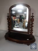 A Victorian mahogany dressing table mirror with barley twist supports