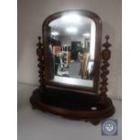 A Victorian mahogany dressing table mirror with barley twist supports