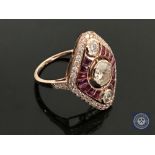 A 14ct rose gold ruby and diamond ring, featuring 1 round brilliant cut diamond 0.