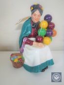 A Royal Doulton figure - The Old Balloon Seller HN 1315