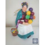 A Royal Doulton figure - The Old Balloon Seller HN 1315