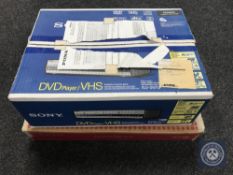 A boxed Sony DVD VHS recorder with remote together with an LG flatron monitor