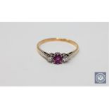 An 18ct gold ruby and diamond ring