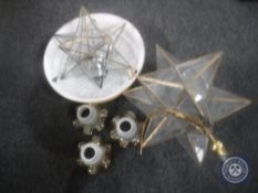 An Art Deco glass light shade together with two brass and glass star light fittings and further