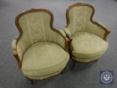 A pair of continental walnut framed salon armchairs