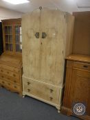 A bleached walnut Queen Anne style double door wardrobe fitted two drawers beneath