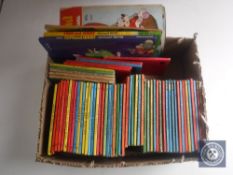 A box of mid 20th century Ladybird books together with Disney Land comic Tom and Jerry Annuals