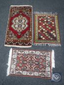 Three Iranian hearth rugs
