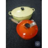 A Le Creuset lidded pan together with an oven dish