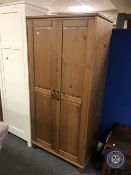 A pine double door wardrobe