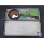 A B&M banjo in case