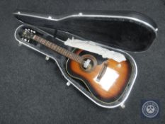 A Hofner semi-acoustic guitar in hard carry case