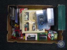 A box of die-cast vehicles including Corgi Omnibus, models of Yesteryear,