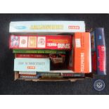 A box of mid 20th century and later board games, Merit chemistry set and microscope set,