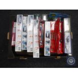 A box of Airfix and Academy model kits,