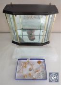 A glass display case together with a quantity of Swarovski ornaments (some a/f)