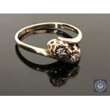 A 9ct gold diamond crossover ring, size N CONDITION REPORT: 1.