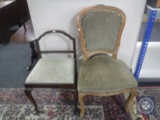 A mahogany dressing table chair and a continental style dining chair