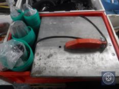 A crate of metal tile cutter,