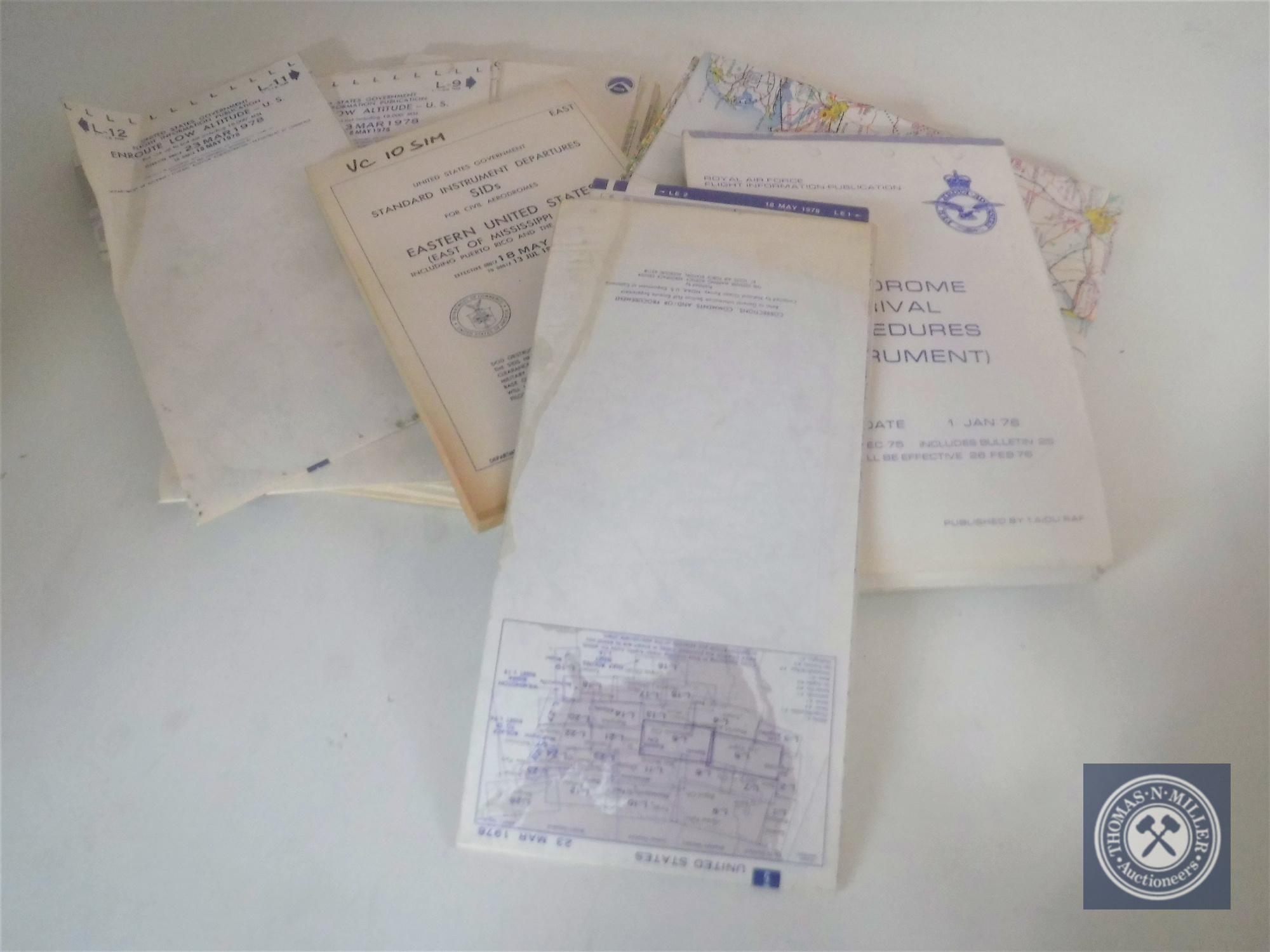 A box of Royal Air Force and US air force procedure booklets,