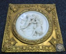 A gilt framed relief panel depicting two Maidens with Child.