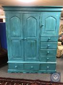 A painted pine compactum wardrobe